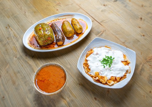 Stuffed Vegetables - Zucchini, eggplant stuffed in rice, spices, tomato sauce served fatteh and crunchy bread