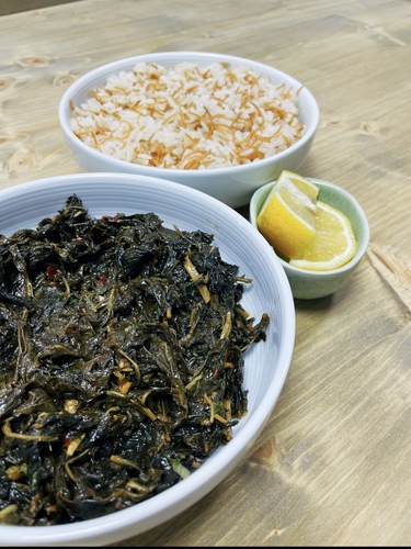 Moloukhiya Leaves - Moloukhiya Leaves Cooked with coriander and garlic served with vermicelli rice