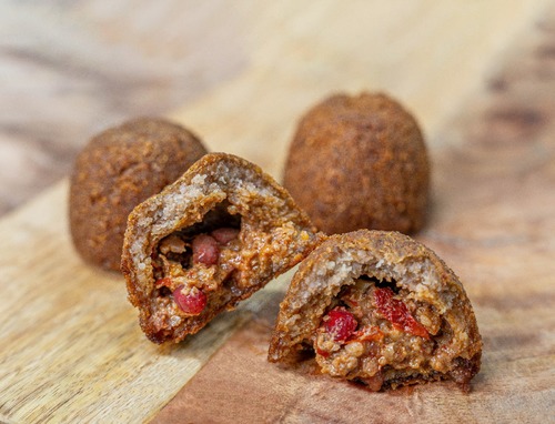 Grilled Kibbeh - Kibbeh stuffed with butter, walnuts and pomegranate cooked with a barbecue flavor