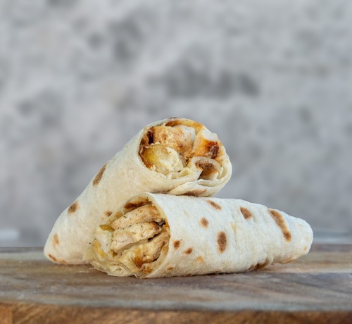 Sheesh Tawook Sandwich - Sheesh Tawook , Fried Potatoes and our special sauce  wrapped with our home made bread