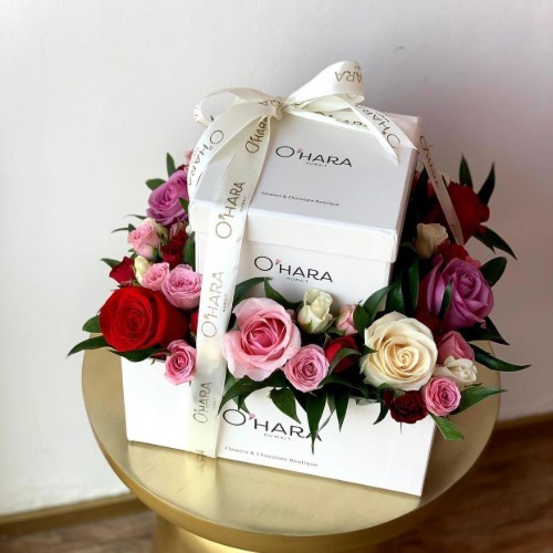 O’HARA   - Double M - It has a mix of roses and baby roses in different colors, and a box contains a mix of 280 grams of Swiss chocolate