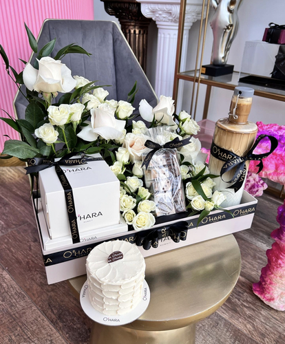 White B package - Mix roses and baby roses and cake and 150 grams of swiss chocolate and 1 liter of cold coffee
