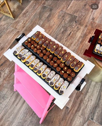 Eclairs&tiramisu trafle tray - Tray contains 24 mini eclairs and 28 tiramisu truffles decorated with gold leaf