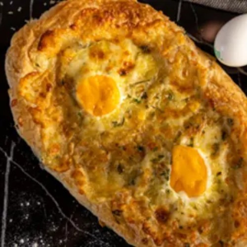 Oven Egg Window - Baked eggs on our crunchy buttery Beiruti dough.