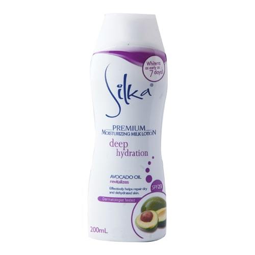 RDL Kuwait - SILKA MOISTURIZING MILK LOTION AVOCADO OIL 200 ML - Silka Moisturizing Milk Lotion is blended with avocado oil and almond milk protein to effectively help repair dry skin. Its non-greasy formula deeply restores the skin, giving you intense and lasting moisture. It is enriched with antioxidant Vitamin E and SPF23 to protect against sun and pollution, and protects against premature aging and dark spots.