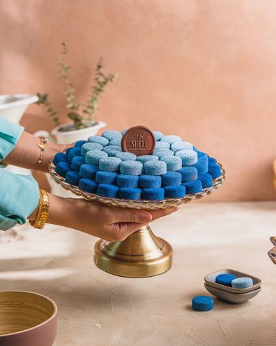 Dark blue tray - cookies with waffer Light blue- almond crunchy with choco ganash Powder blue  caramel salted with maskarponi