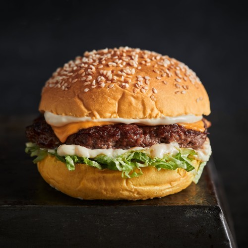 Truffle Burger - Sesame potato bun, single beef patty, yellow cheese, Truffle sauce, lettuce