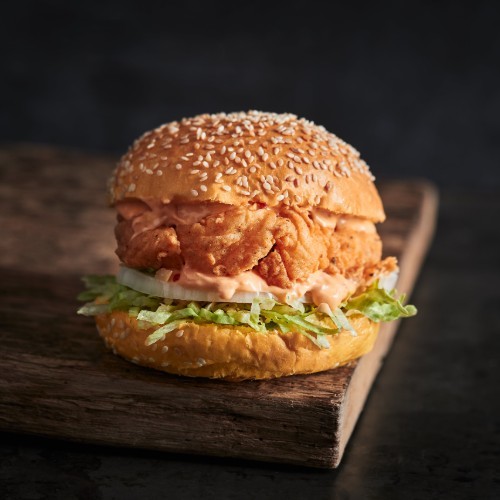 Spicy Bad Chicken - Sesame potato bun,chicken breast,lettuce,fresh onion,cheddar cheese,bad spicy sauce