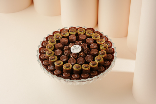 Best seller of the month - Crystal plate A variety of coffee sweets to suit all tastes 75 pieces of delicious fillings Salty Nuts, Pecan Crunchy Pistachio slice and toffee Covered with Belgian chocolate