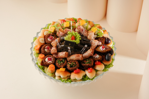 Crystal plate of mini savories mix - Crystal vase Assortment of kebab and mini pastries About 75 fresh pills Prepared daily upon request