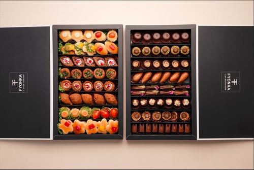 Zwara offer - Two large boxes elegant for all your visits containing 50 pcs of our finest Belgium chocolate and 50 pcs of mini fatayer and mini kobba fresh