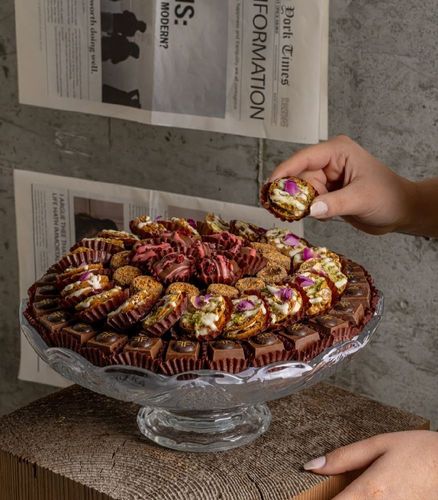 Choco-Crunchy Tray - Crystal tray contains mixed of chocolate delights with crunchy pistachio and roasted almonds with sesame