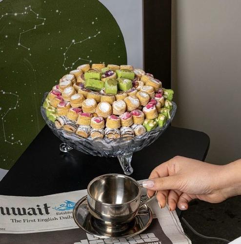 Tray of Kuwaiti Ghraiba - A variety of Kuwaiti Ghraiba filled with saffron cream, strawberry, and walnut.