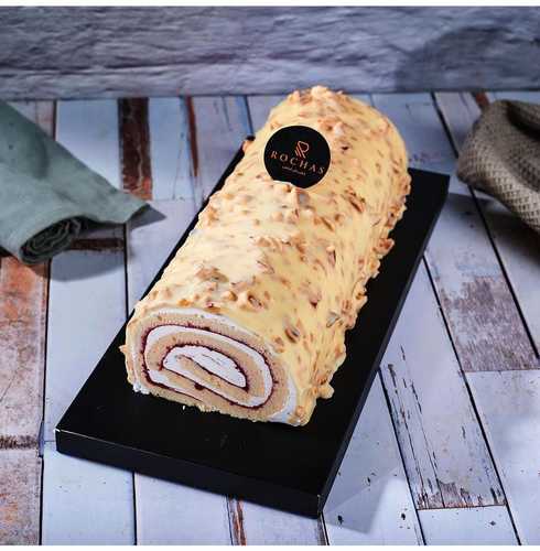 Swiss Roll Vanilla - كيك الفانيليا الهش مع كريمه و صوص الفراوله مغلفه بصوص الكاكاو الابيض