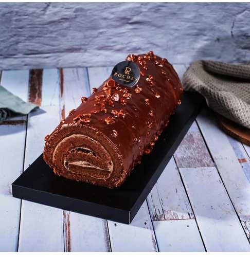 Swiss Roll Chocolate - Delicious chocolate cake with snickers filling covered with Belgian cocoa sauce