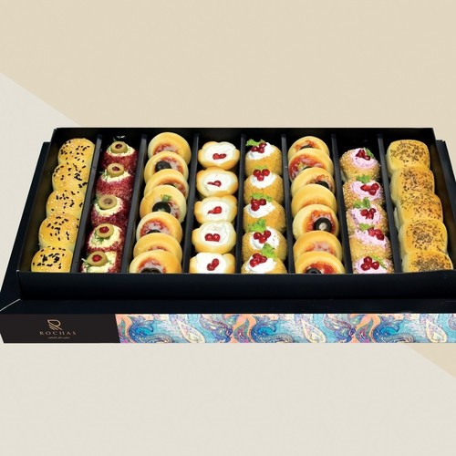 Mini fatayer - Cheddar cheese. Cream cheese. Mushroom mix. Feta cheese with beetroot. Pizza. Labneh.