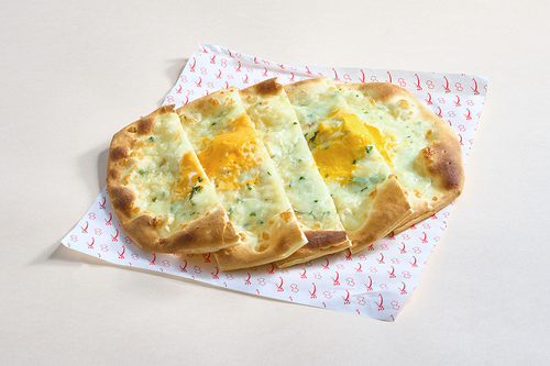 Oven Egg Mashrouha - Fresh eggs with mozzarella cheese.