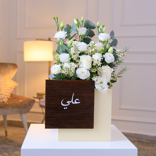 Harmony - Wooden vase arranged with beautiful white baby roses  
 Height: 50cm - Width: 25cm