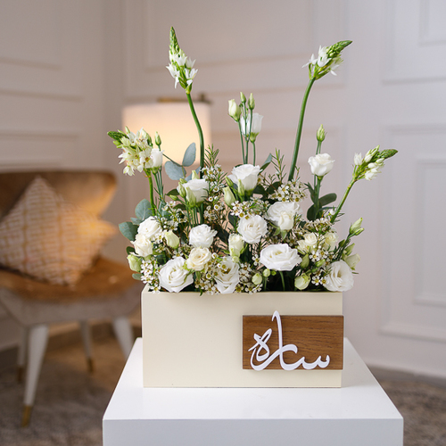 Forest Fantasy - Wooden vase arranged with beautiful white baby roses  
 Height: 65cm - Width: 30cm