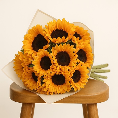 Golden Radiance - Sunflower Bouquet - Bright, cheerful, and bold — this sunflower bouquet is the perfect expression of warmth and positivity.Wrapped in our signature luxury paper and hand-tied to perfection, this arrangement brings light into any space.