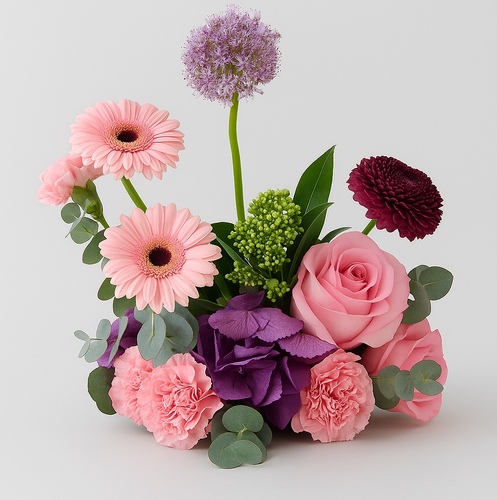 Blush Harmony - symphony of soft pink Gerberas, romantic roses, velvety carnations, and deep plum hydrangeas, Allium bloom, fresh eucalyptus and seasonal greenery.