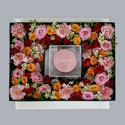 Saint I - Saint I Box contains red, pink and orange roses and mini Congrats cake Width: 40 cm x 30 cm 
   Height: 13 cm