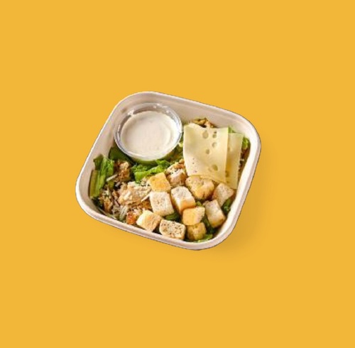 Classic Caesar salad - Romaine lettuce, grilled chicken, croutons, parmesan cheese, emmenthal cheese caesar dressing