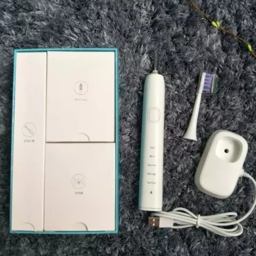 فرشاة الاسنان كهربا مع قاعدة