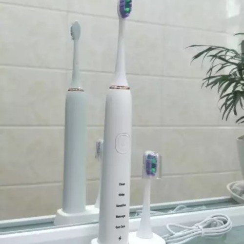 فرشاة الاسنان كهربا مع قاعدة