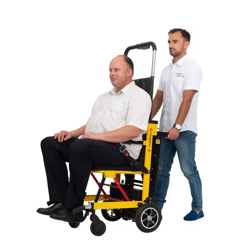Electric stair climbing chair - Advanced Electric Climbing System
Equipped with a powerful electric motor that helps raise and lower the chair up and down stairs easily and without significant physical effort.
🛡 High Patient Safety
• Stable safety harness to protect the occupant.
• Fixed armrests and sides for greater stability.
• Comfortable, non-slip seat surface.
👨⚕️ Easy One-Person Operation
Only one person is needed to move the patient up and down stairs, making it ideal for home, medical, and ambulance use.
♿ Ergonomic Foldable Design
• Folds easily for storage.
• Relatively lightweight and suitable for car transport or mobile use.
• Height-adjustable top handle for increased control.
⚙️ Sturdy Wheels for Easy Mobility
The chair is equipped with smooth-rolling front and rear wheels, making it easy to maneuver around the house or in tight spaces.
