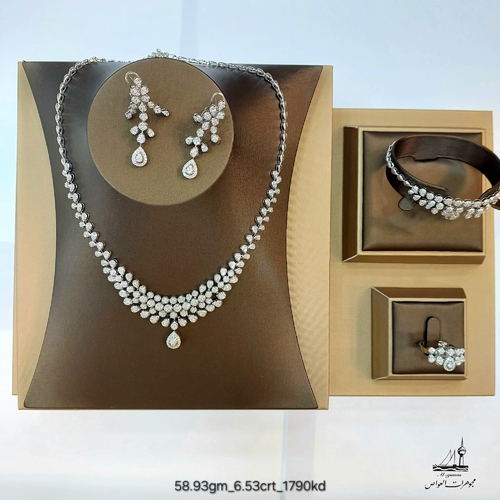 DIVER JEWELLERY (مجوهرات الغواص) - (58.93)gr (6.53)crt VVS/FG L.G.D طقم الماس مخبري و ذهب عيار ١٨