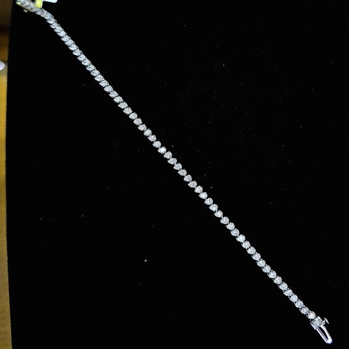 Tennis breclet Diamond (18k) weight (6.62)gr (3.2)crt (VVS-EF) size 19cm L.G.D