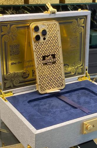 16 Pro Max device plated with 24-karat gold