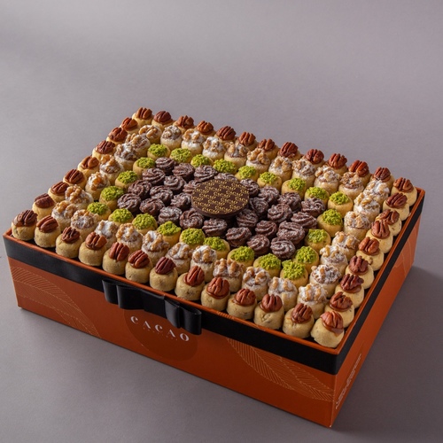 orange box goriba & petitfour - A large box contains three types of ghariba, pecan, walnut, pistachio and chocolate petit four.
More than 120 pisces