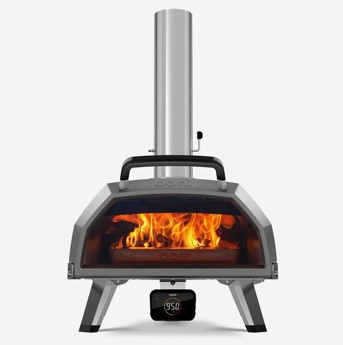 Ooni Karu 2 Pro - With Karu 2 Pro, you’re in control. Choose between cooking with wood or charcoal for a traditional, authentic experience and wood-fired flavor. Opt for gas* for unbeatable convenience and ease by switching to the Karu 2 Pro’s gas burner attachment which is fitted in less than a minute. The Karu 2 Pro’s spacious, 17” cooking area offers endless options. You can make everything from family-sized 16-inch pizzas to whole roast chickens, hefty tomahawk steaks and deep-dish pies. Reaches up to 950 °F to make flame-cooked, restaurant-quality pizzas in just 60 seconds. The extra large glass door is made with high-temperature resistant borosilicate glass, and features ClearView™ technology, creating an airwash effect that prevents sooty buildup on the glass. You can watch the magic (you know, cheese bubbling, crusts rising, pepperoni crisping, all the good stuff) happen, while keeping the heat in. Get instant temperature readings to your phone with the Bluetooth-enabled Ooni Connect™ Digital Temperature Hub. Air temperatures inside the oven are displayed automatically so you know when its ready to cook. Use the included digital food probe to take the temperature of meats as they cook, to achieve perfect cooking results every time. Karu 2 Pro’s outer coating keeps the elements at bay while the carbon steel shell and densely layered insulation lock in heat as you cook, so Karu 2 Pro will keep on cooking for plenty of seasons to come. No cleaning is required - with the high temperatures of the Karu 2 Pro self-cleaning the oven by burning off any food spills to leave your stone clean, and the Fuel Tray can be removed after cooking for easy ash disposal. Features Ooni’s patented Flame Keeper technology for optimised air flow and heat distribution within the oven for a more even cooking experience.
