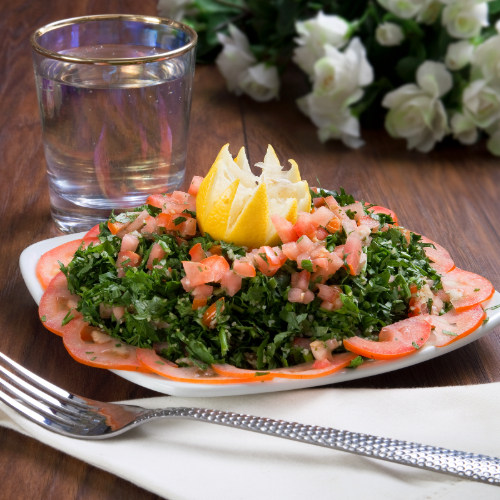 Tabbouleh - parsley and fresh tomatoes mixed with Bulgur with olive oil and lemon