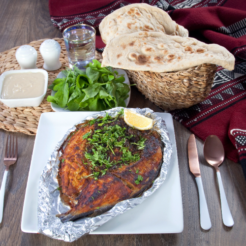 Grilled Tilapia - Served with tahini, bread and rocca it needs 90 minutes to be prepared.