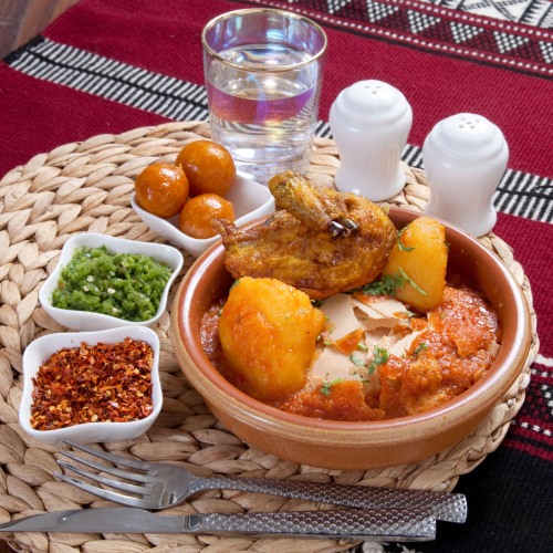 Tashreeb Chicken - Rokak with chicken and pata broth served with red mabog, green mabog, Agar and Luqaimat