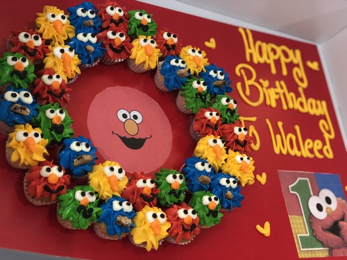 sesame street with Elmo picture - 3 Dozens mini cupcakes Please keep your writing that you want on the board in the box below