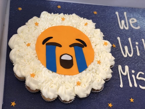 crying emoji - mini cupcakes Please keep your writing that you want on the board in the box below