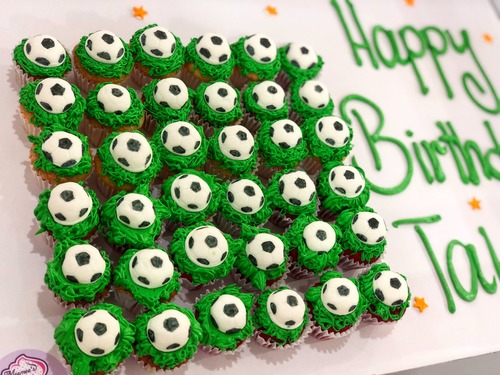 Football on top - mini cupcakes Please keep your writing that you want on the board in the box below