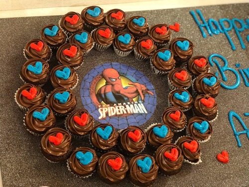 Spiderman with chocolate - 3 Dozens mini cupcakes Please keep your writing that you want on the board in the box belowThis Design with Chocolate Flavor and all the chocolate Flavor comes with nuts