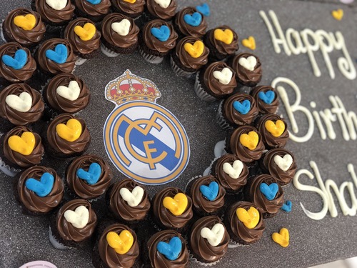 Chocolate real Madrid - 3 Dozens mini cupcakes Please keep your writing that you want on the board in the box belowThis Design with Chocolate Flavor and all the chocolate Flavor comes with nuts