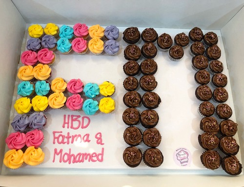 2 letters Chocolate + mix - 5 to 6 Dozens mini cupcakes Please keep your writing that you want on the board in the box belowThis Design with Chocolate Flavor and all the chocolate Flavor comes with nuts