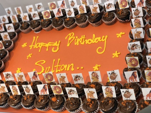 6 Dozens lion king flags - 6 Dozens mini cupcakes  Please keep your writing that you want on the board in the box belowThis Design with Chocolate Flavor and all the chocolate Flavor comes with nuts