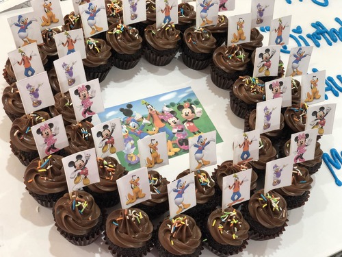 Mickey Mouse & Friends chocolate - 3 Dozens mini cupcakes Please keep your writing that you want on the board in the box belowThis Design with Chocolate Flavor and all the chocolate Flavor comes with nuts