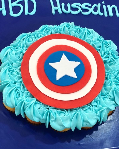 Captain America Shield - mini cupcakes Please keep your writing that you want on the board in the box below