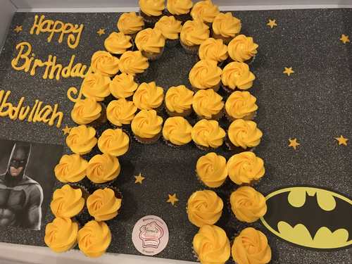 Batman letter - 3 Dozens mini cupcakes Please keep your writing that you want on the board in the box below