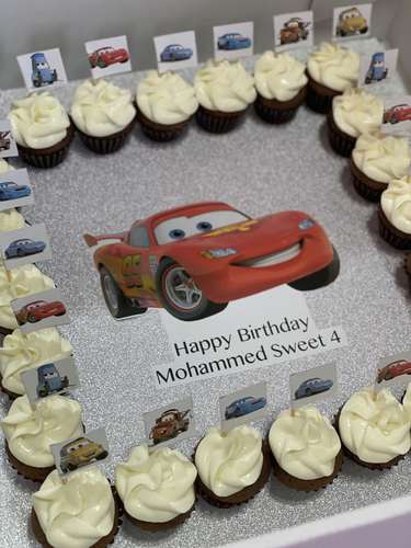 Cars McQueen - 2 Dozens mini cupcakes Please keep your writing that you want on the board in the box below