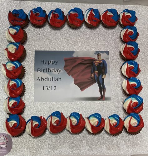 superman - 2 Dozens mini cupcakes Please keep your writing that you want on the board in the box below